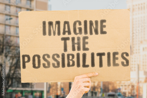 Wallpaper Mural The phrase " Imagine the Possibilities " is on a banner in men's hands with blurred background. Obstacle. Achieved. Persistence. Optimist. Impossibility. Achiever. Optimization. Motivate. Plan Torontodigital.ca
