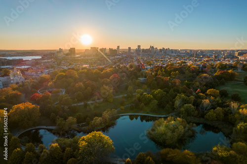 Fototapeta Naklejka Na Ścianę i Meble -  Aerial Drone View of Patterson Park in Baltimore City in Fall at Sunset with the City Skyline in the Distance