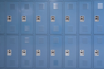 close up on blue lockers in the school