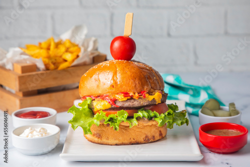 Homemade hamburger served w...