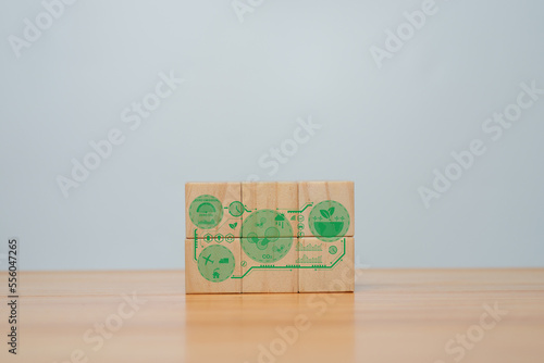 Long-term, climate-neutral strategy, wooden cubes with carbon emission reduction and green icon, Low carbon, carbon neutral concept,green banne.