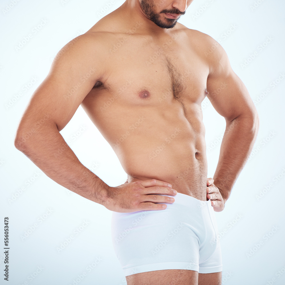 Fitness, wellness and body of man in studio with muscles for healthy lifestyle, workout and bodybuilder training. Motivation, exercise and muscular torso, abdomen and stomach of athlete in underwear