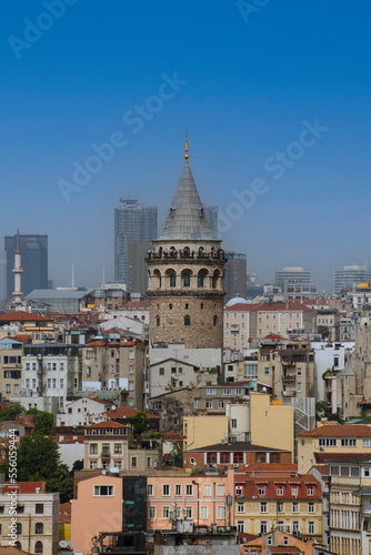 View of Galata Tower of Istanbul in Turkey. Sky and cloud background. View of Istanbul. Turkish name: Galata Kulesi. August, 2022. © AhmetUtkan