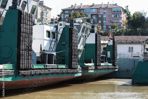 Rubber bumpers mounted on bows of pushers at Danube river. photo