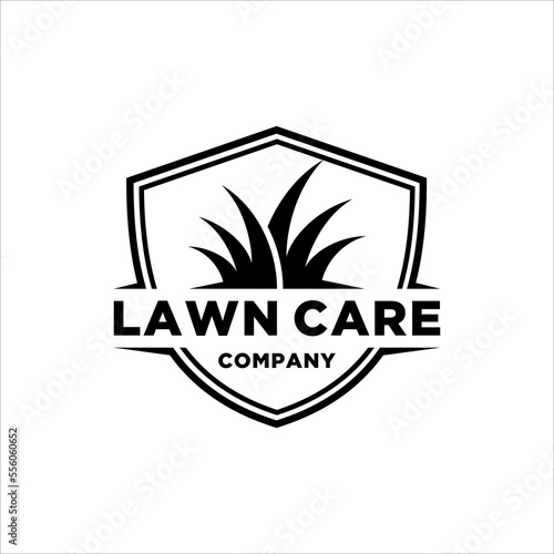 Lawn care logo in shield badge with masculine style design