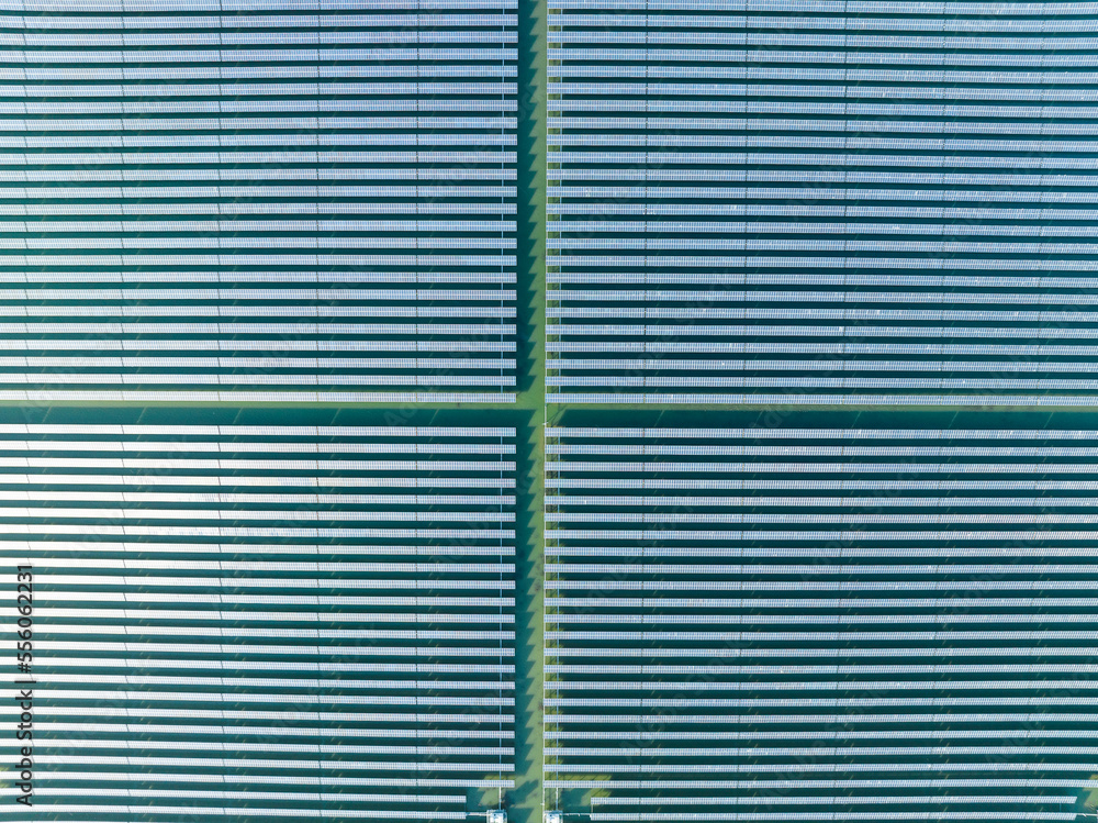 Aerial view of modern solar plant on water