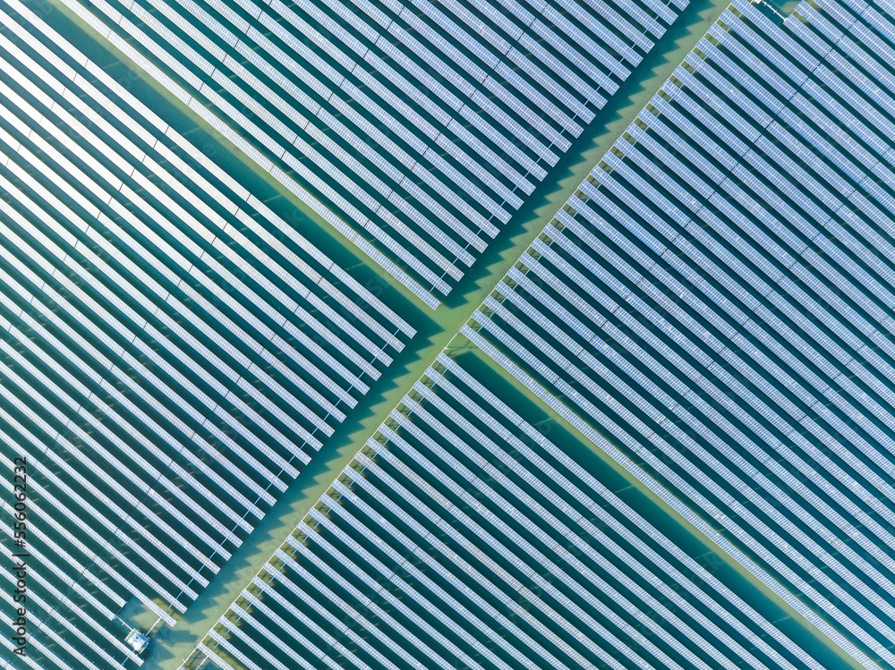 Aerial view of modern solar plant on water