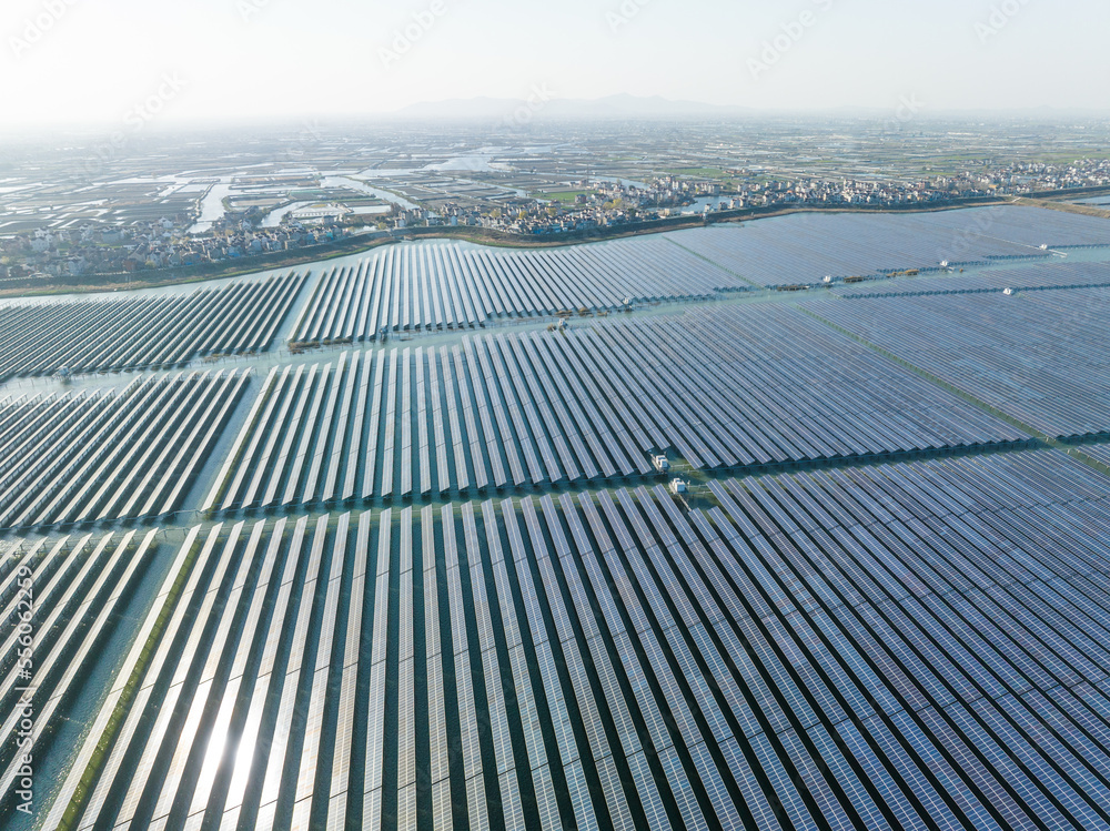 Aerial view of modern solar plant on water