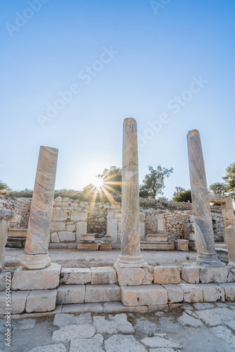 Ancient city columns of Patara (Pttra) with blue sky. The ancient city of Patara (Pttra) at sunset. Patara (Pttra). Ruins of the ancient Lycian city. Antalya Turkey