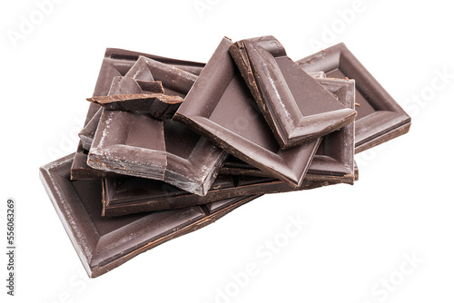 Dark chocolate pieces, cubes on a heap, broken chocolate isolated on transparent background