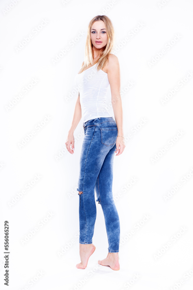Figure attractive blonde woman in blue jeans pants Figure attractive blonde woman in blue jeans pants