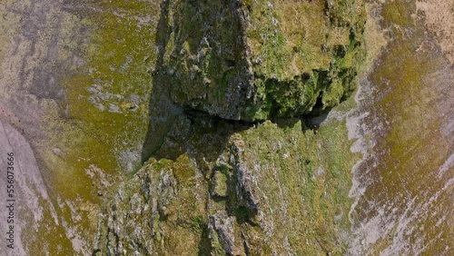 Top View Drone Shot Zooming In On The Tip Of Eystrahorn Mountain's Sharp Ridges photo