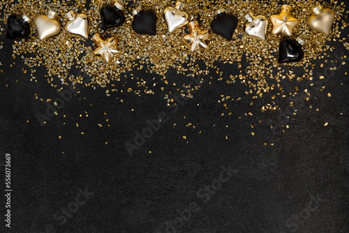 Golden black ornaments baubles glitter. Christmas background