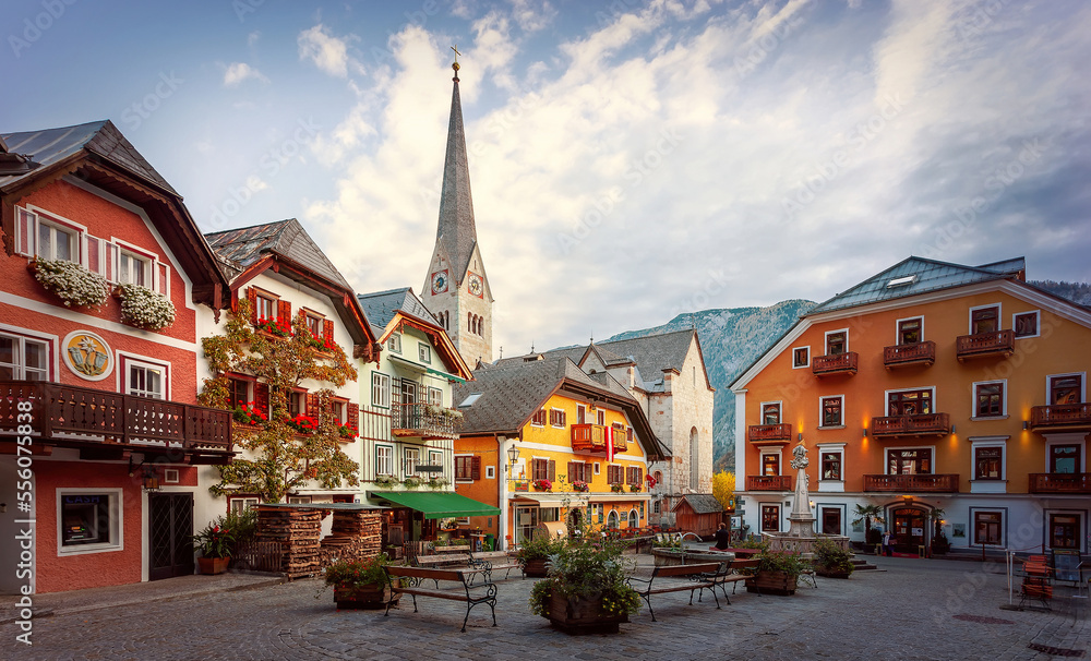 Naklejka premium Hallstatt square. Wonderful view of famous Hallstatt mountain village in the Austrian Alps, Salzkammergut region, Hallstatt, Austria. Creative image. Scenic picture-postcard.
