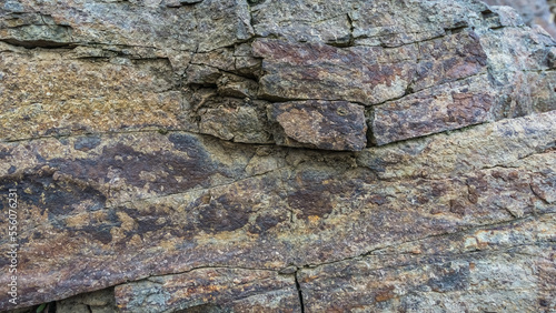 Texture of gray stone. Andesite cracked rock photo