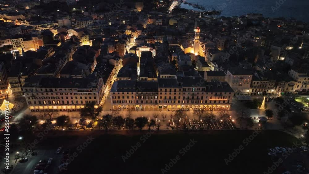 Aerial drone view of the citylights of Corfu city at night. Kerkyra. Corfu island. Greece. Aerial drone view of the citylights of Corfu city at night. Kerkyra. Corfu island. Greece.