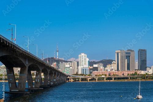 Seoul cityscapes, skyline, high rise office buildings and skyscrapers with blue sky and cloud in Seoul city, winter daylight, top view in winter, Seoul, Republic of Korea, © lukyeee_nuttawut