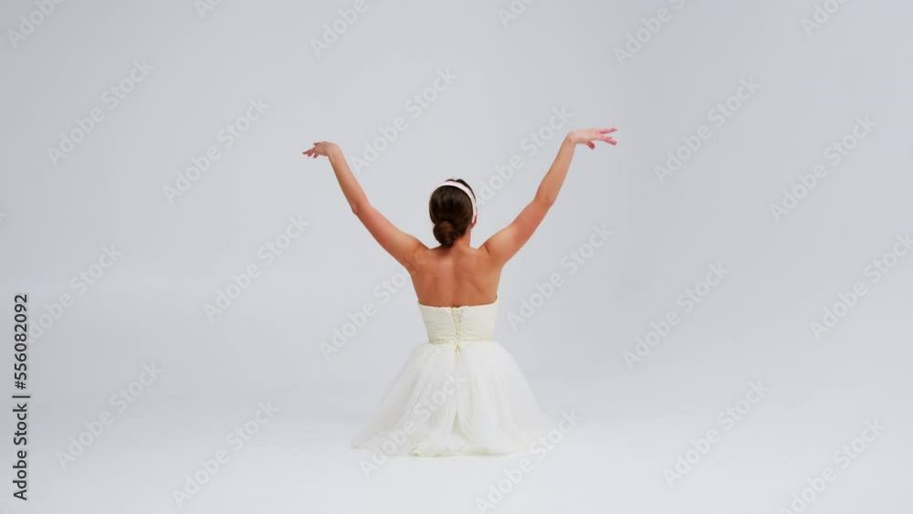 Young flexible ballerina dancing and performing acrobatic elements with a chair. Modern dramatic ballet. Slow motion. Close up. Young flexible ballerina dancing and performing acrobatic elements with a chair. Modern dramatic ballet. Slow motion. Close up.