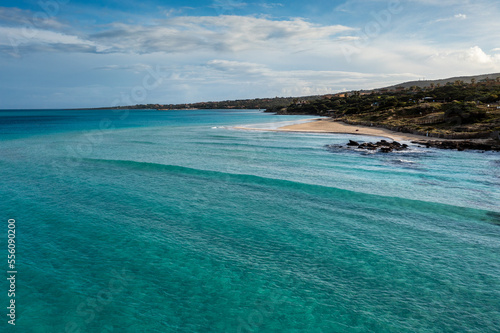 aerial view of the picturesque white sand beach of La Pelosa near Stintino in Sardinia