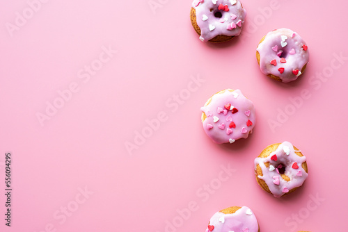 Small donuts isolated on pink background