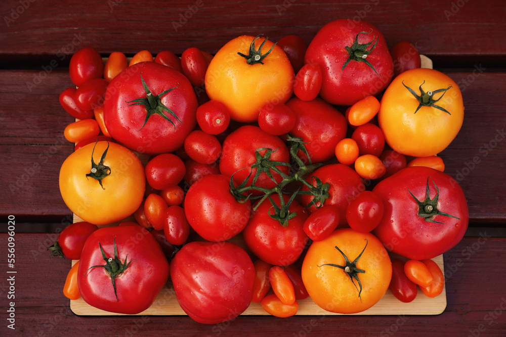Many fresh tomatoes on wooden surface, top view Many fresh tomatoes on wooden surface, top view