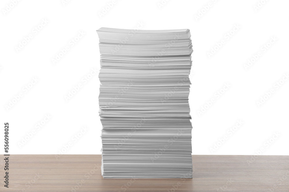 Stack of paper sheets on wooden table against white background