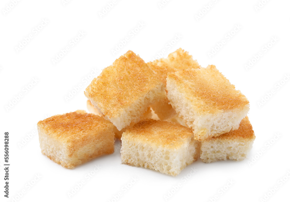 Pile of delicious crispy croutons on white background Pile of delicious crispy croutons on white background