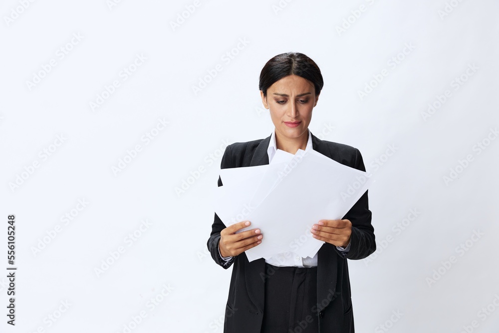 Business woman throwing papers documents in black business suit showing signals gestures and emotions on white background, freelancer job online time management Business woman throwing papers documents in black business suit showing signals gestures and emotions on white background, freelancer job online time management