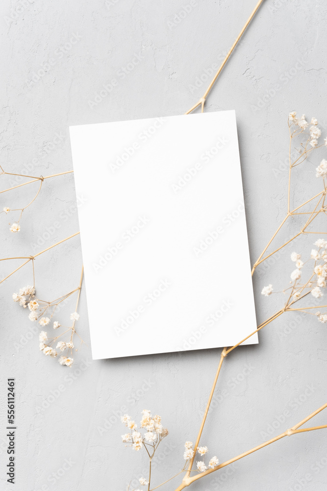 Invitation or greeting card mockup with dry gypsophila, blank card with botanical decoration Invitation or greeting card mockup with dry gypsophila, blank card with botanical decoration