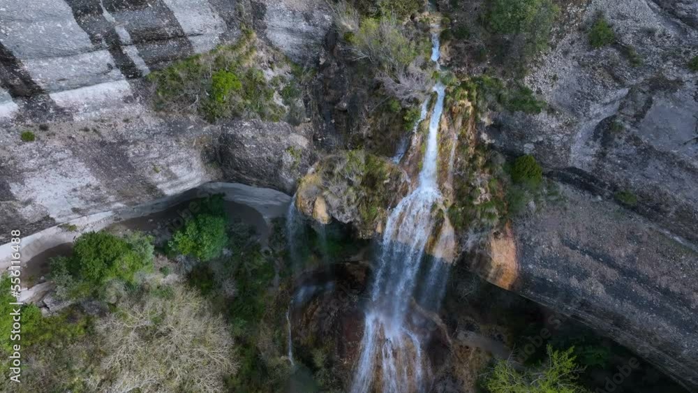 La Mea waterfall seen from a drone. Between Quintanilla Valdebodres and Puentedey in the area of the Canales del Dulla. The Merindades. Burgos. Spain. Europe La Mea waterfall seen from a drone. Between Quintanilla Valdebodres and Puentedey in the area of the Canales del Dulla. The Merindades. Burgos. Spain. Europe