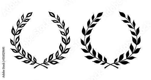 Two stylish variants of laurel wreath, hand drawn vector illustration.