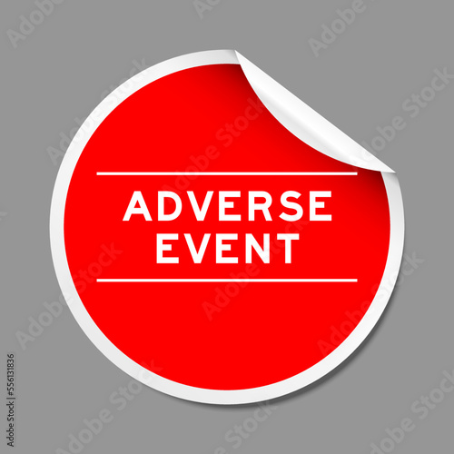 Red color peel sticker label with word adverse event on gray background