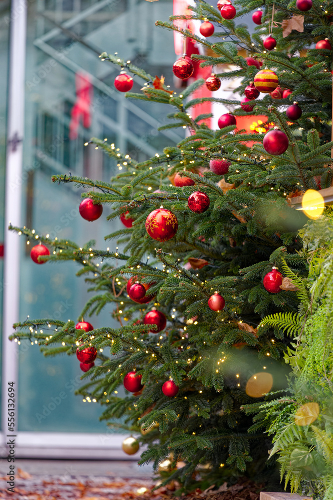 Christmas tree with Christmas lights and red and golden Christmas baubles decoration at City of Zürich on Christmas Eve. Photo taken December 24th, 2022, Zurich, Switzerland. Christmas tree with Christmas lights and red and golden Christmas baubles decoration at City of Zürich on Christmas Eve. Photo taken December 24th, 2022, Zurich, Switzerland.