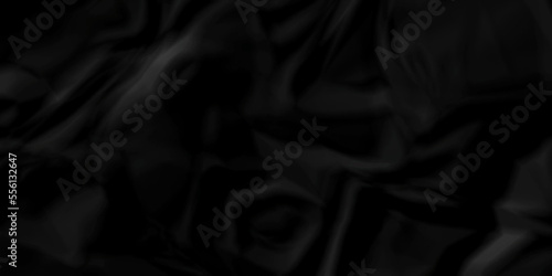 Dark Black facbric paper backdrop crumpled texture. dark black textured crumpled black paper background. panorama black paper texture background, crumpled pattern.