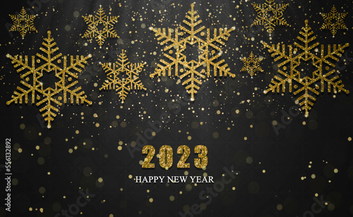 happy new year 2023. Golden letters on a black background. gold bokeh. golden snowflake.