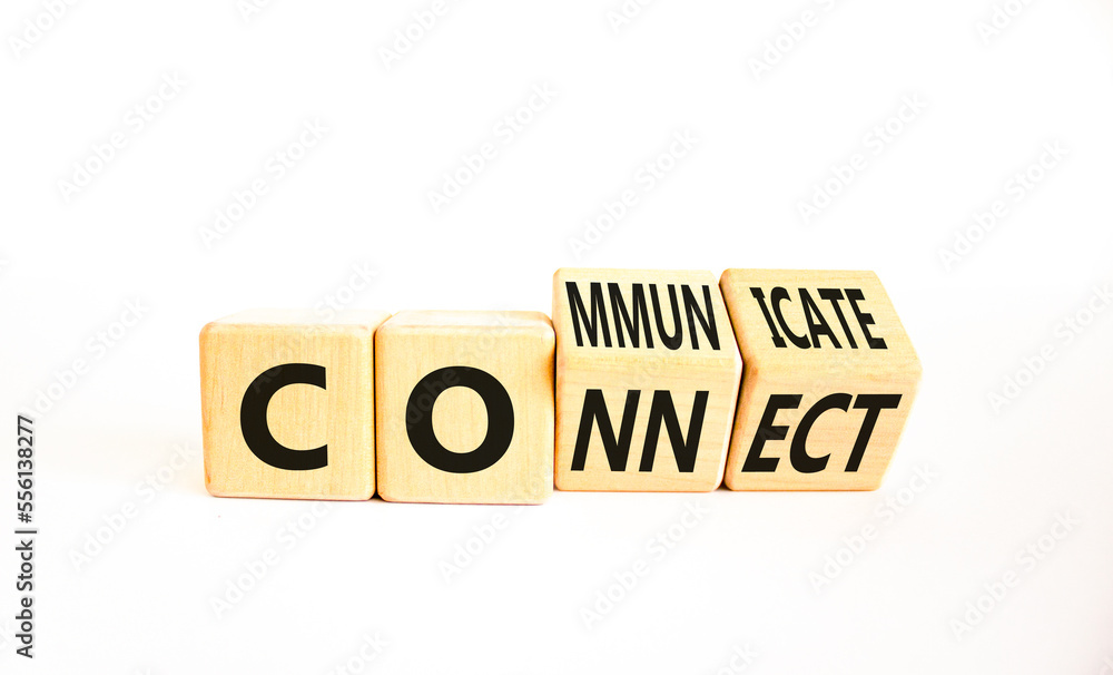 Connnect or communicate symbol. Concept word Connnect or Communicate on wooden cubes. Beautiful white table white background. Business connnect communicate concept. Copy space. Connnect or communicate symbol. Concept word Connnect or Communicate on wooden cubes. Beautiful white table white background. Business connnect communicate concept. Copy space.