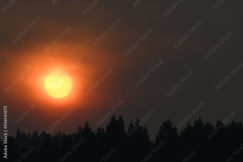 Fototapeta premium Smokey sunset in the Alberta foothills