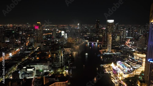 Wallpaper Mural HYPERLAPSE Aerial View Shot of Bangkok City Skyline at night with the Chao Phraya River, Bangkok, Thailand. Torontodigital.ca