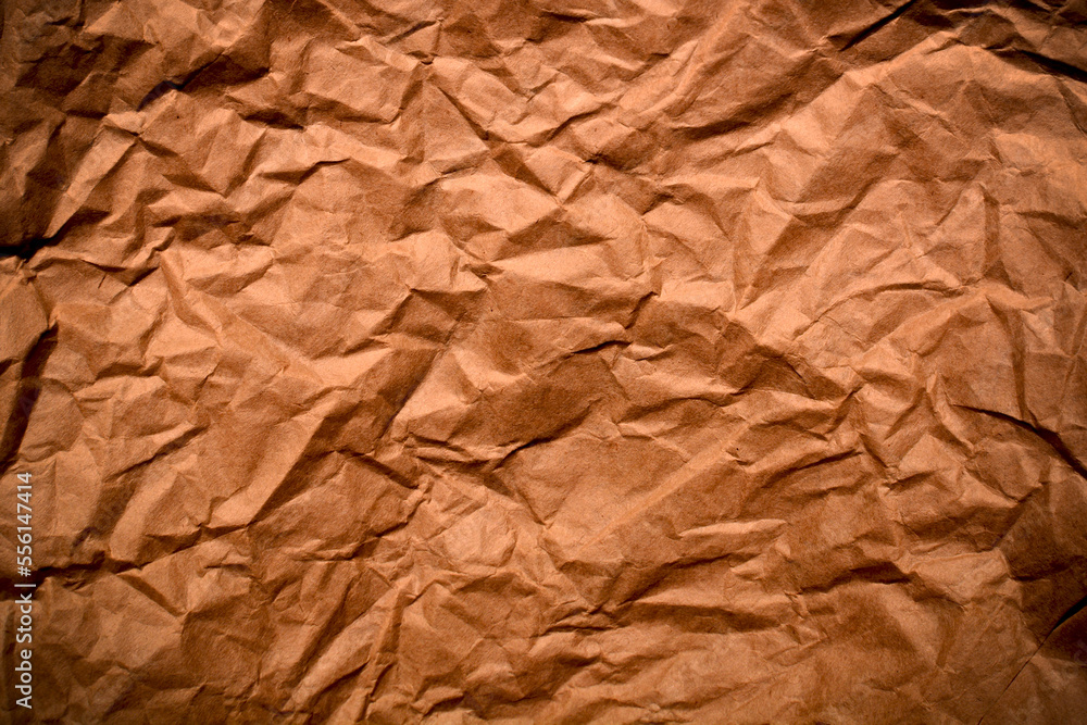 Sheet of crumpled craft paper. Texture, surface, background. Sheet of crumpled craft paper. Texture, surface, background.