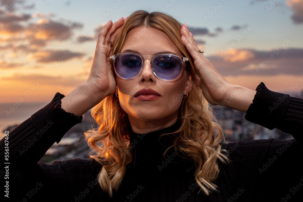 Beautiful female model wearing colorful glasses at sunset. Outdoors  romantic portrait of attractive blonde woman with makeup and glasses  posing. Istanbul archipelago (Princess Islands) skyline. Photos | Adobe  Stock