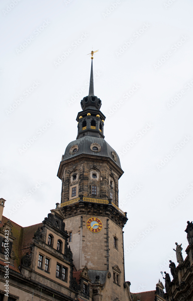 historic building tower with clock in another in the old town of dresden germany