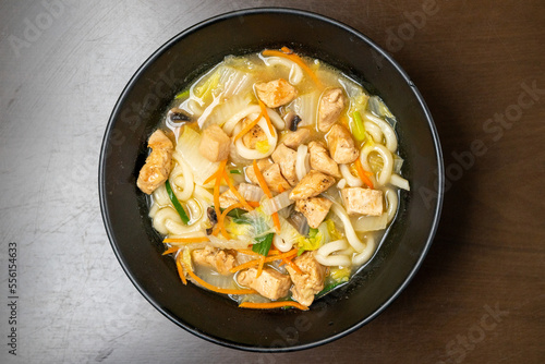 Chicken udon soup in a bowl