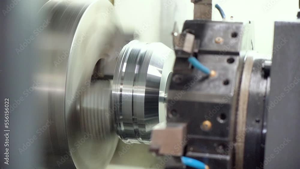 Cnc Lathe Machine makes Metal Detail On Factory Cnc Lathe Machine makes Metal Detail On Factory