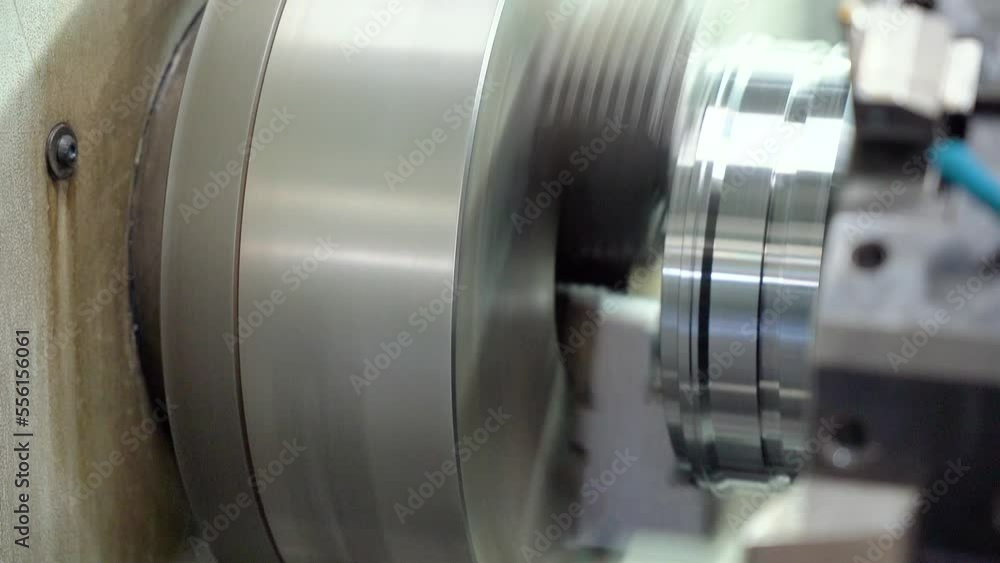 Cnc Lathe Machine makes Metal Detail On Factory Cnc Lathe Machine makes Metal Detail On Factory