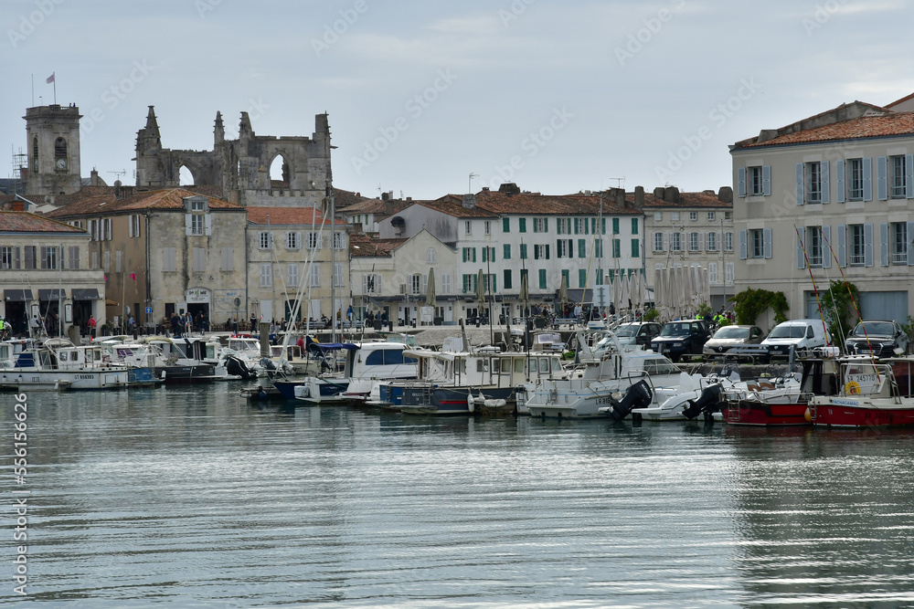 Saint Martin de Re; France - october 25 2022 : picturesque village and boat in the port