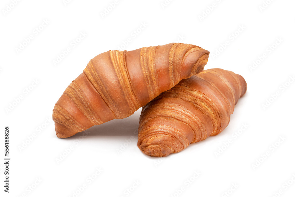 French croissants isolated on a white background. Fresh pastries