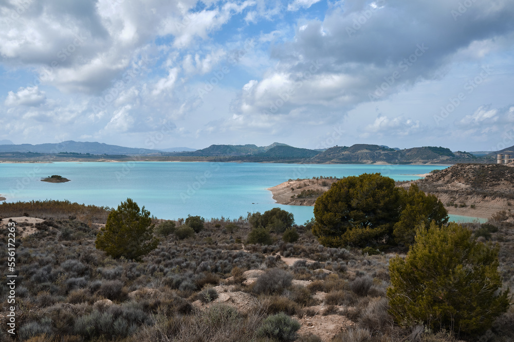 turquoise reservoir in the mountains
Embalse de la Pedrera reservoir. Alicante Spain