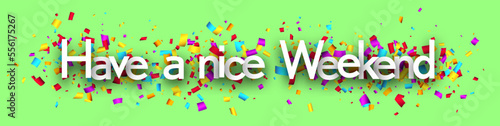 Have a nice weekend sign on cut ribbon confetti green background.