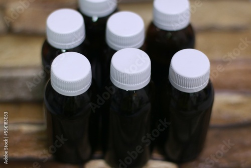 bottle with syrup for children from temperature