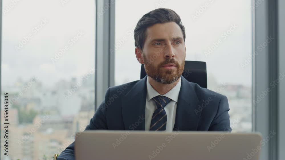 Manager writing work notes in notebook sitting at office close up. Man working. Manager writing work notes in notebook sitting at office close up. Man working.